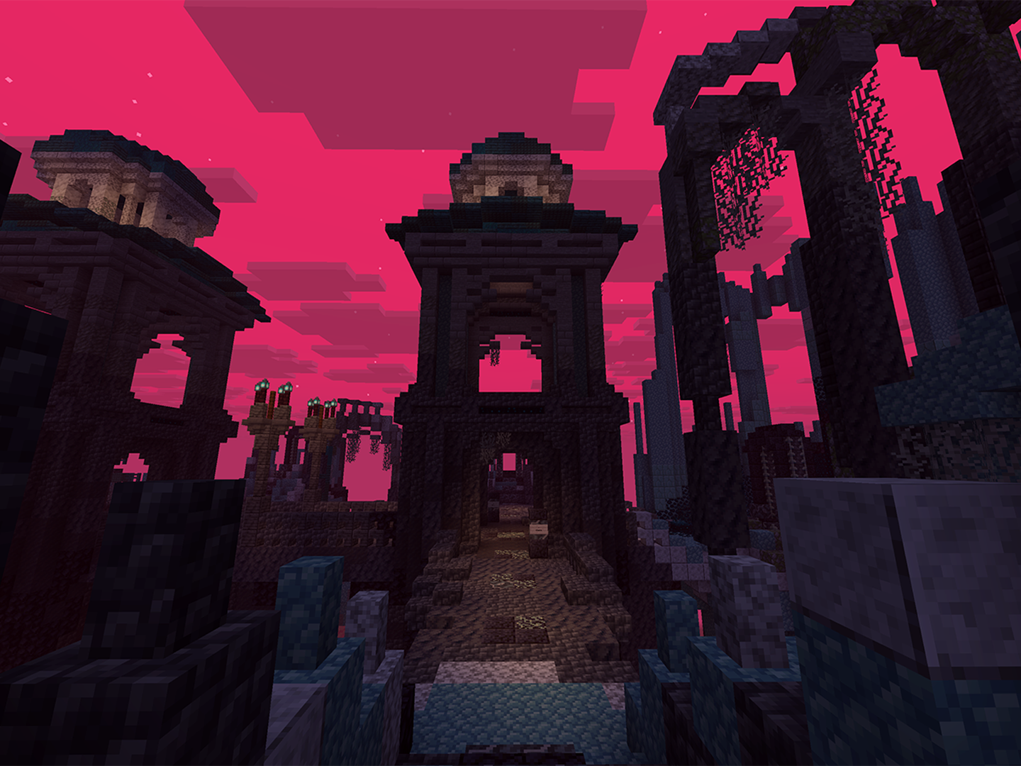 A foreboding Minecraft build featuring a central tower and a looming blood-red sky.